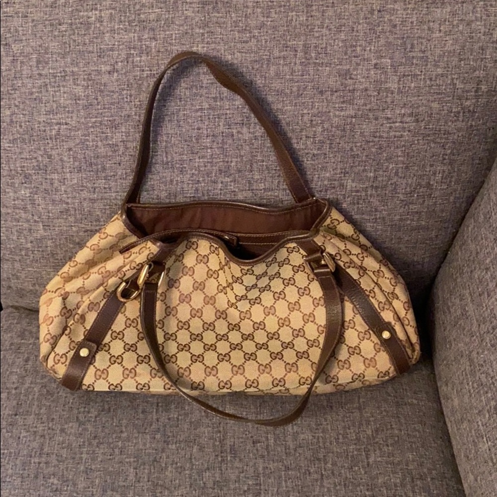 Gucci monogram bucket bag.